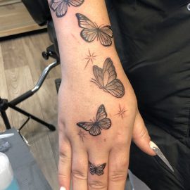 Butterflies tattoo on hand