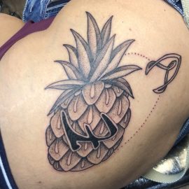 Upside down pineapple tattoo