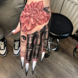 Skeleton fingers tattoo