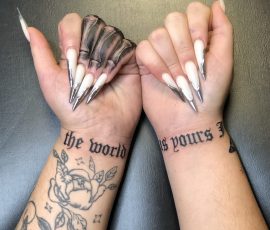 Script tattoos on wrists