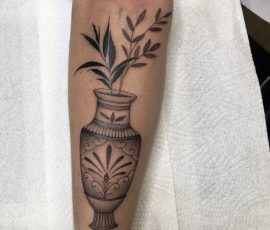 Vase of flowers tattoo