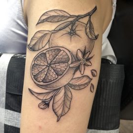 Orange tattoo done by Anna Skrok at Tiger and Rose Tattoo, Tottenham, London