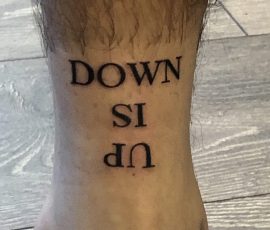 Script tattoo on ankle