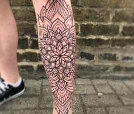 geometric tattoo on shin