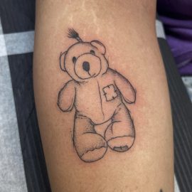Teddy bear tattoo