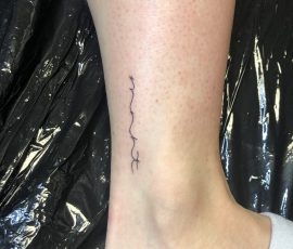 fine line script tattoo