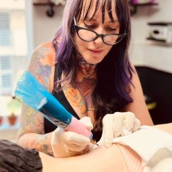 Dana Dana Depta, owner and artist at Tiger & Rose Tattoo
