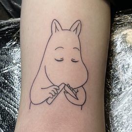 Moomin tattoo done at Tiger & Rose Tattoo, North London