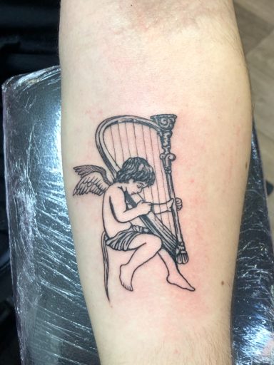 Cherub tattoo done at Tiger and Rose Tattoo, London