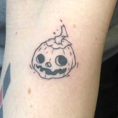 illustrative pumpkin tattoo done at Tiger and Rose Tattoo, London