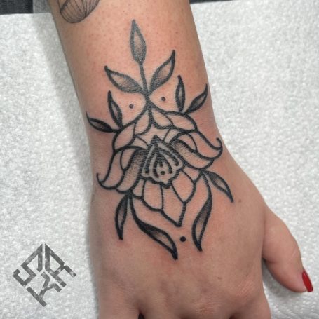 Flower tattoo done at Tiger and Rose Tattoo, London