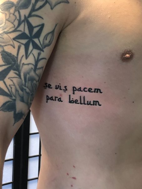 Quote tattoo on ribs done at Tiger and Rose Tattoo, London