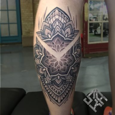 Geometric tattoo done at Tiger and Rose Tattoo, London