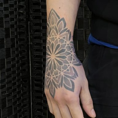 Geometric hand tattoo