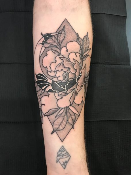 Flower tattoo done at Tiger and Rose Tattoo, London