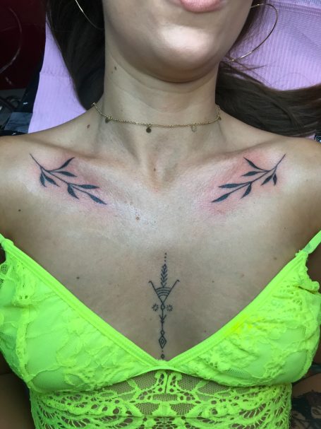 Olive branches tattoos done at Tiger and Rose Tattoo, London