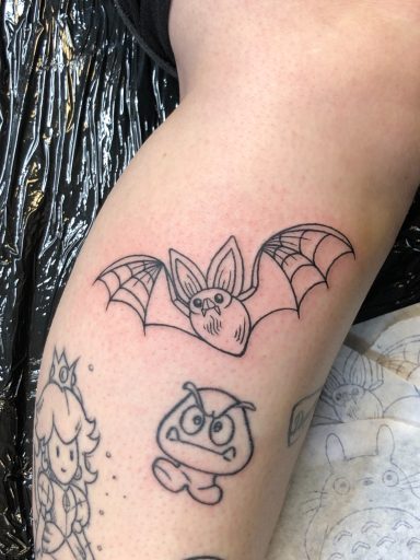 Cartoon bat tattoo done at Tiger and Rose Tattoo, London