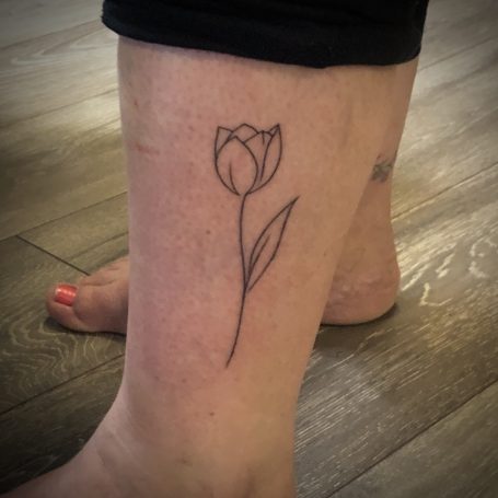 Tulip tattoo done at Tiger and Rose Tattoo, London